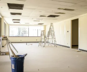 Refurbishment Services this image shows an office refurbishment with work being done to the ceilings, walls and flooring