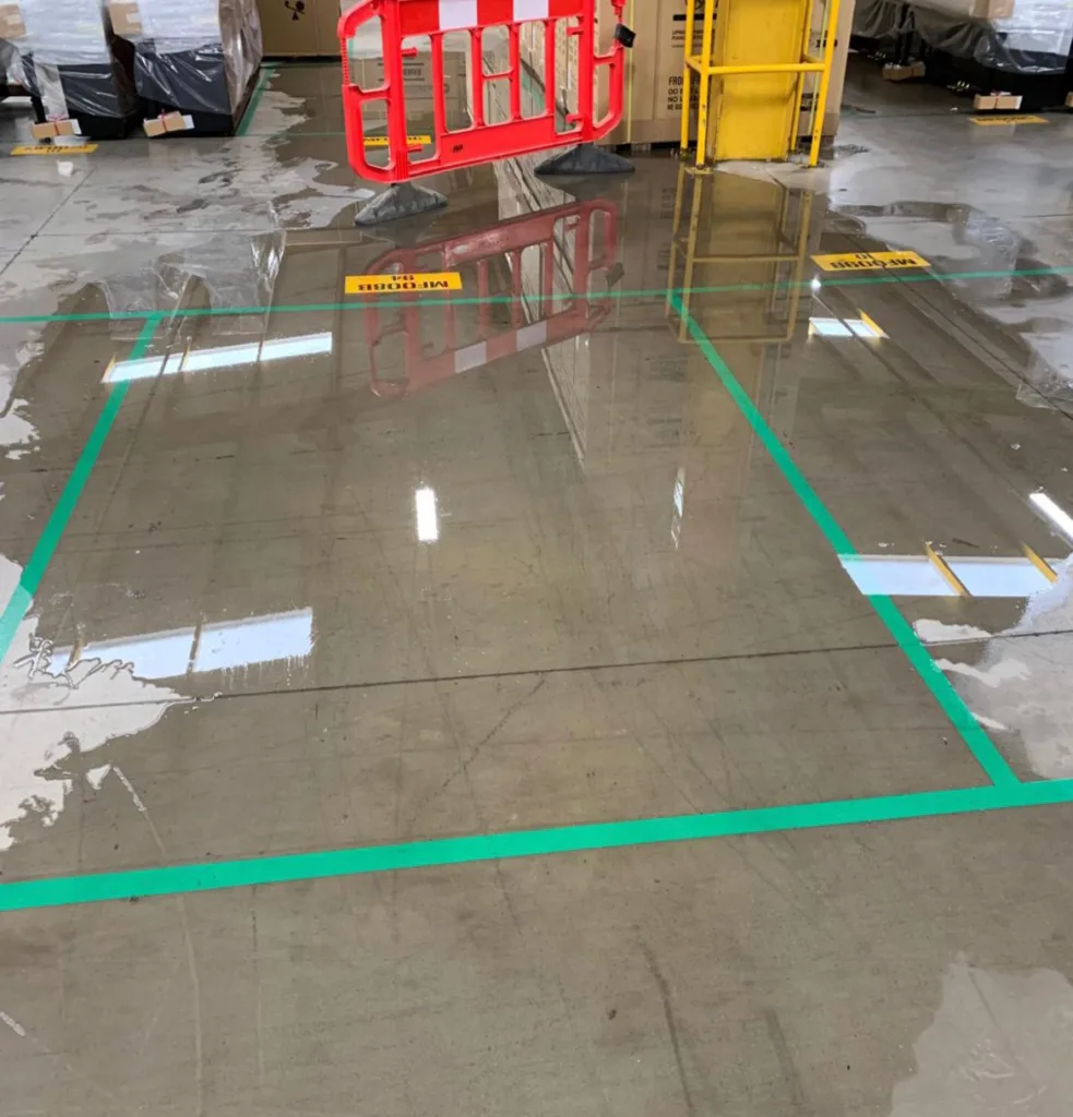 The Risks of Delaying CAPEX this image shows a flooded warehouse