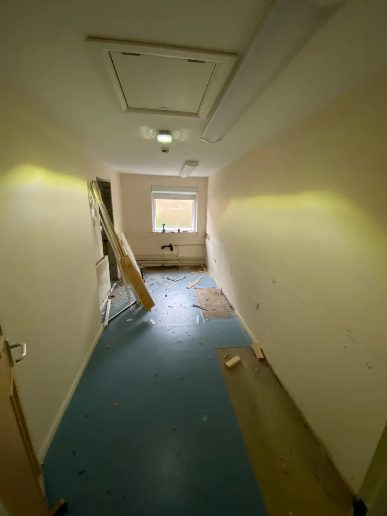 Store room before refurbishment at Slated Row School Milton Keynes showing unused narrow space