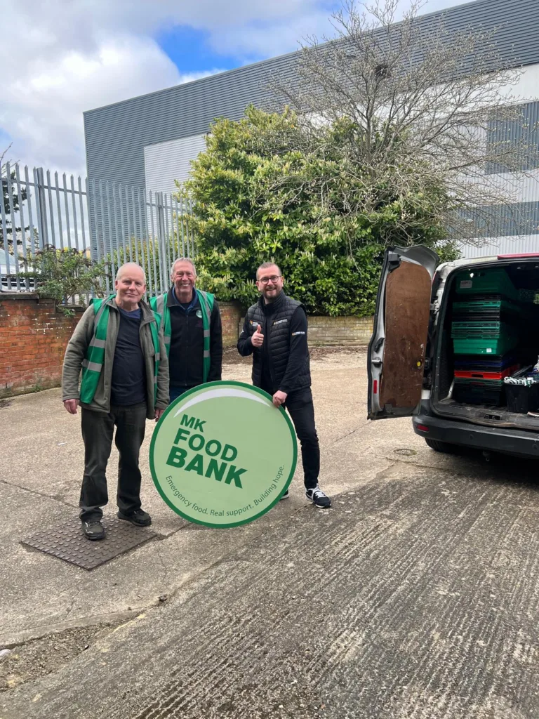 Matt from Facilities Management Solutions collecting donation crates from MK Food Bank for workplace distribution in Milton Keynes