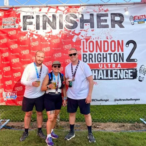 Matt, Odette and Rob at the finish line for the Ultra Walk 100K